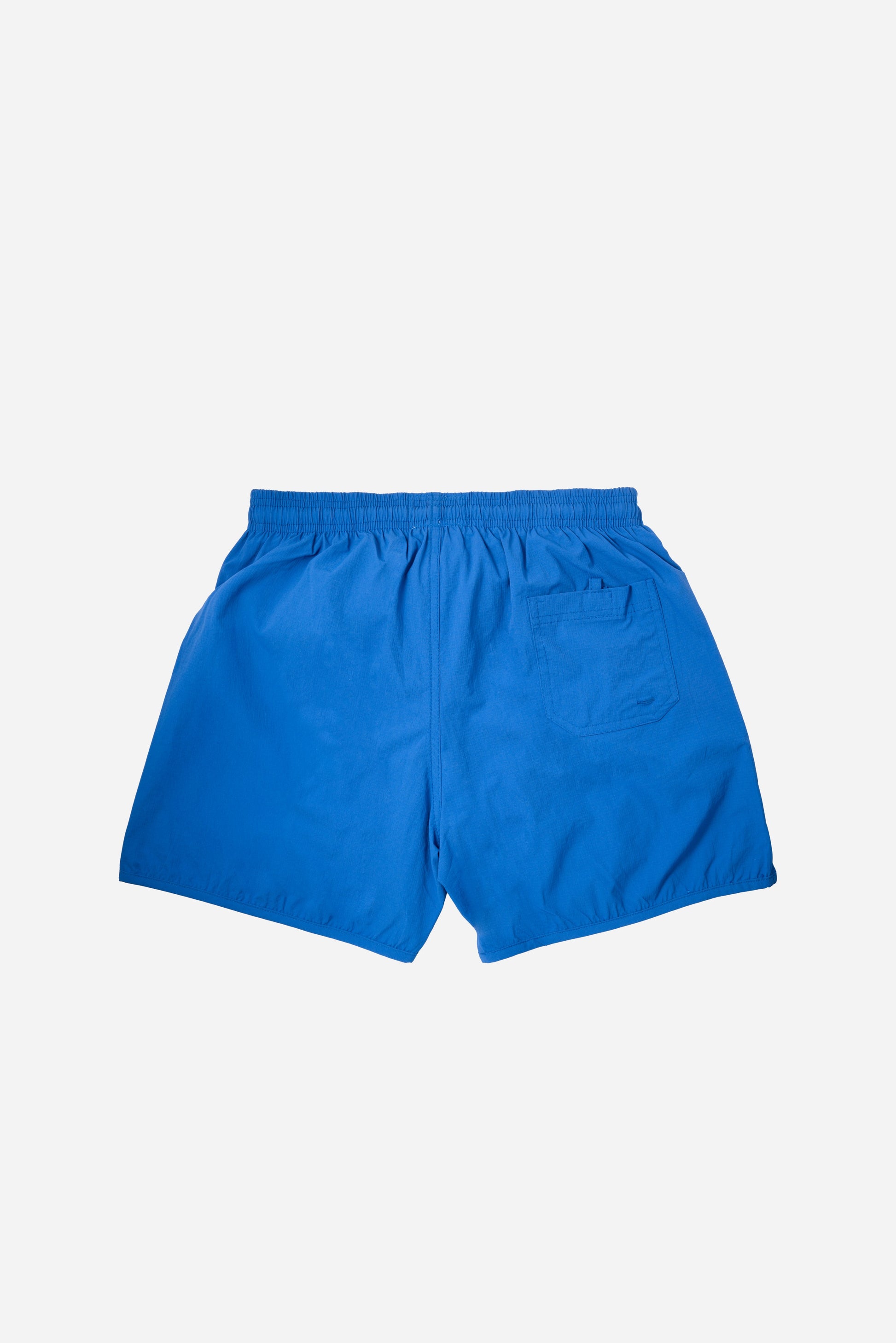 Voyager Swim Shorts in royal blue, back flat lay with pocket detail