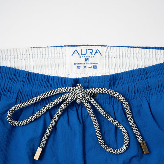 Voyager Swim Shorts in royal blue, waistband and drawstring detail