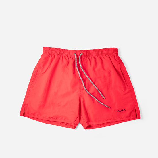 Voyager Swim Shorts in scarlet red, front flat lay