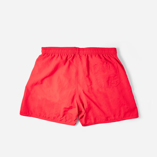 Voyager Swim Shorts in scarlet red, back flat lay with pocket detail