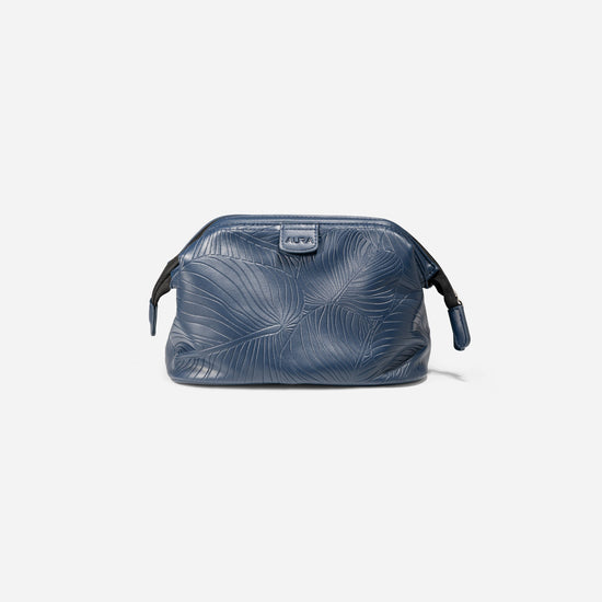 AURA wash bag in horizon blue with leaf-embossed leather and zip pull